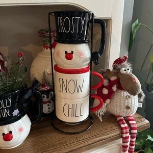 Rae Dunn Frosty stacked mugs.